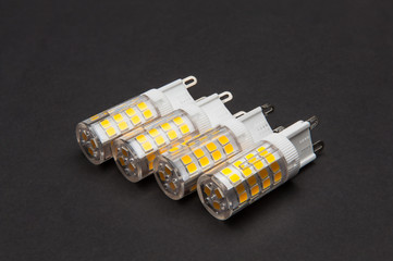 energy saving lamp on a dark background