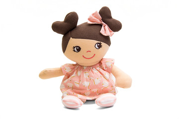 Baby doll soft toy isolated on white