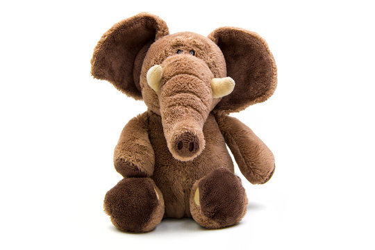 Brown elephant soft toy isolated on white