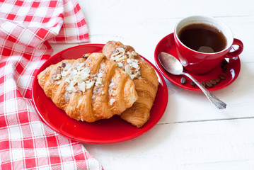 Breakfast with coffee and croissants.