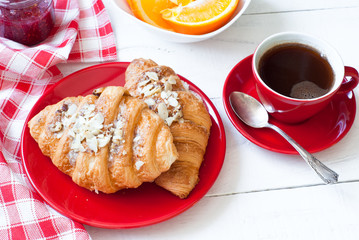 Breakfast with coffee and croissants.