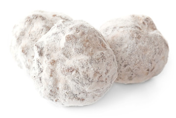 Chocolate salami candies with powder, isolated on white