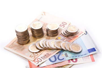 Haufend M&uuml;nzen und Scheine