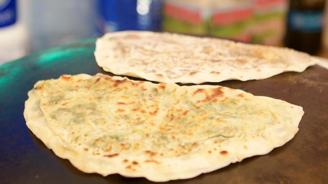 Traditional Turkish food gozleme cooking on market