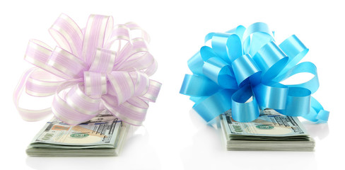 Dollars and two big bows isolated on white