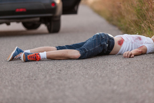 Young boy run over by a car