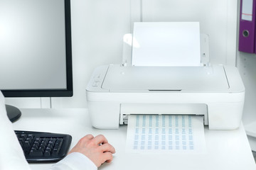 Fototapeta premium Composition of white printer and black computer in modern office