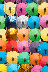 Fototapeta na wymiar Colorful umbrella texture on the wall.