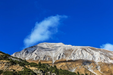 Beautiful bright contrasting mountain landscape with mountain to