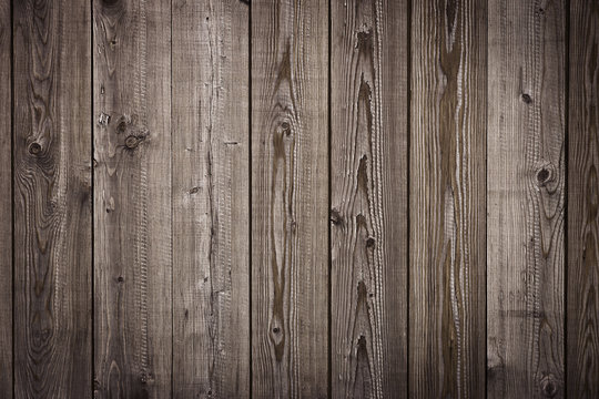 Old wooden dark brown boards, chocolate color fence, textured background