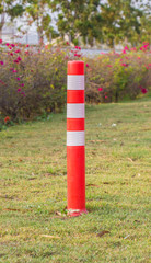 Traffic cone on a parking lot in the park.