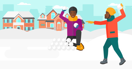 Men playing in snowballs.