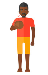 Man drinking cocktail.