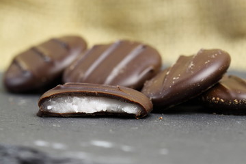 Chocolates cream filling slate / Cream filled chocolates on a slate surface.