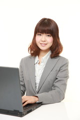 young Japanese businesswoman smiles