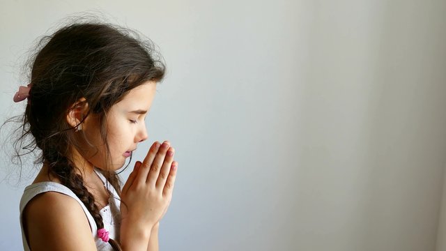 girl teen  praying church belief in god 