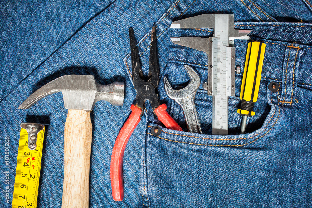 Wall mural tool kit in jean pocket