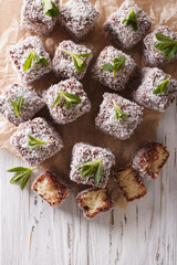 Australian Lamington cake with coconut. vertical top view

