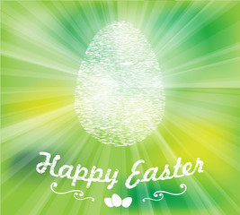 Easter white egg on a green background.