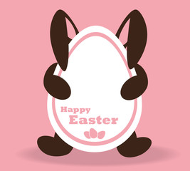 Chocolate Easter Bunny on a pink background.
