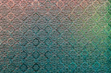 Glass traditional thai style texture decorated on the window.