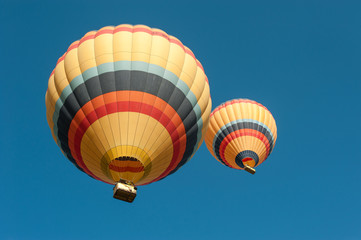 Naklejka premium Two hot air balloons in Cappadocia, Turkey.