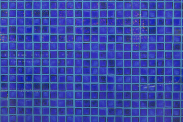 An image of tiles floor background and blue tile wall high resolution real photo