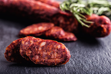 Sausage Chorizo. Spanish traditional chorizo sausage, with fresh herbs, garlic, pepper and chili peppers. Traditional cuisine.
