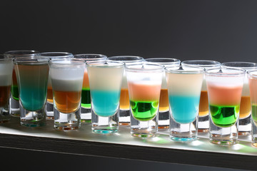 Rows of tasty shots cocktails
