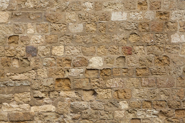 Medieval stone wall in Cordoba, Andalusia, Spain. Background tex