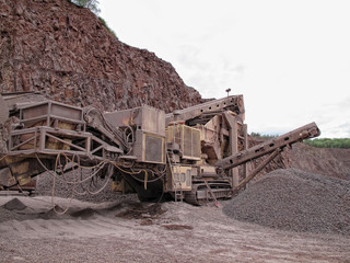 Fototapeta na wymiar stone crusher in porphyry surface mine. hdr image