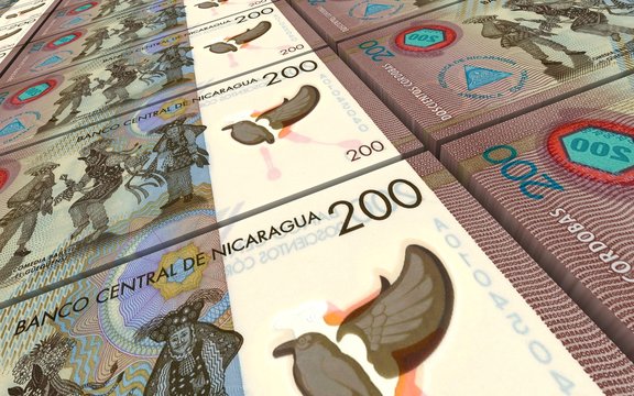 Nicaraguan cordoba bills stacks background. Computer generated 3D photo rendering.