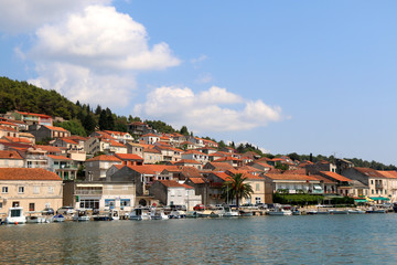 Fototapeta na wymiar Family houses in small town Vela Luka, on Korcula island, in Croatia.