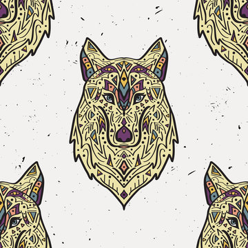 Vector grunge colorful seamless pattern with tribal style wolf with ethnic ornaments. American indian motifs. Boho design.American indian motifs. Boho design.