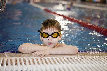 little boy have fun on swimming pool 