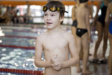little boy have fun on swimming pool 