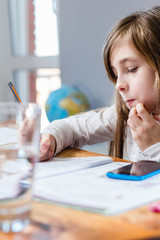 Young girl doing homework