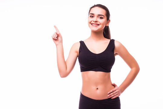 Young slim  Fitness woman hold hand showing something on the open palm, concept advertisement product. Isolated over white background