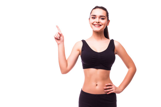 Young slim  Fitness woman hold hand showing something on the open palm, concept advertisement product. Isolated over white background