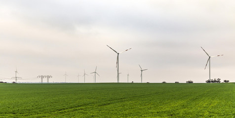 Fototapeta na wymiar wind generators in rural landscape