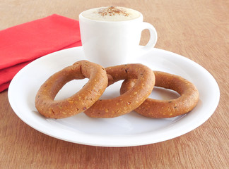 Indian vegetraian fried snack, kodubale, and coffee.