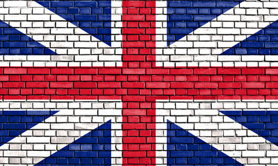 Fototapeta premium old Union flag painted on brick wall