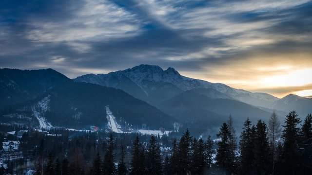 World cup ski jumping in Zakopane at sunset, 4k timelapse.
