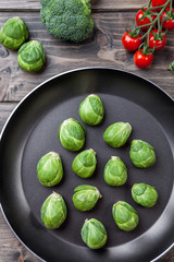 Fresh organic brussel sprouts in a frying pan