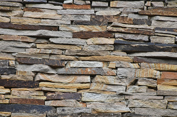 Old stone layered wall