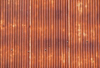 Old bright rust corroded metal goffered surface
