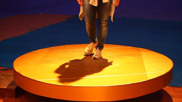 Female Legs on Round Table