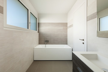 Obraz na płótnie Canvas modern bathroom with bathtub