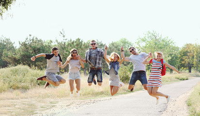 A group of joyful friends having fun outdoors