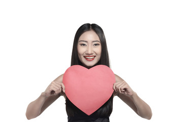 Beautiful asian girl holding red heart